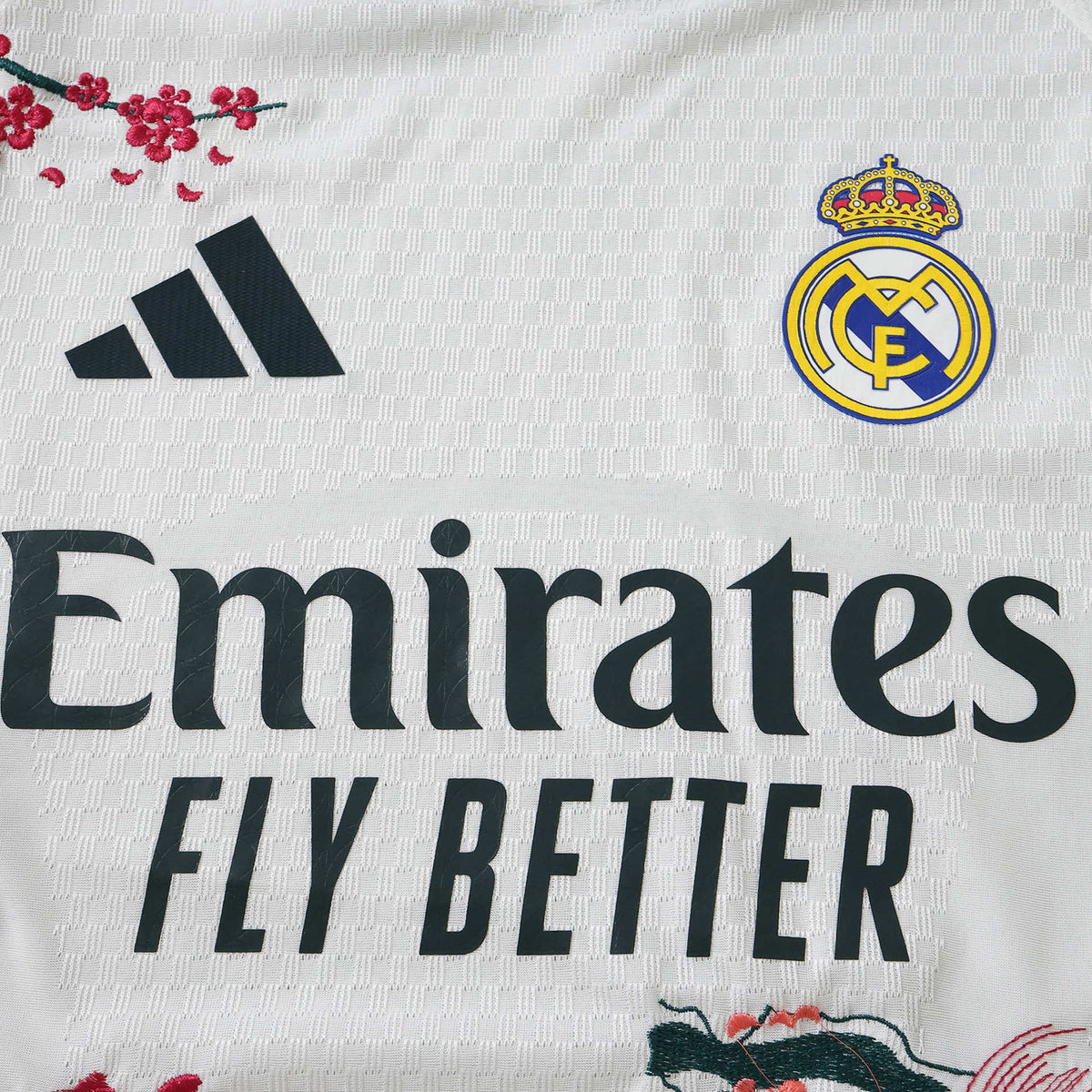 Embroidered Home Sakura 26/27 Player Edition Shirt